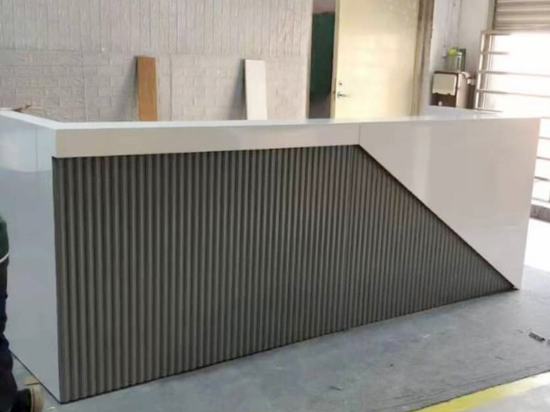 White and Gray Patterned Reception Desk